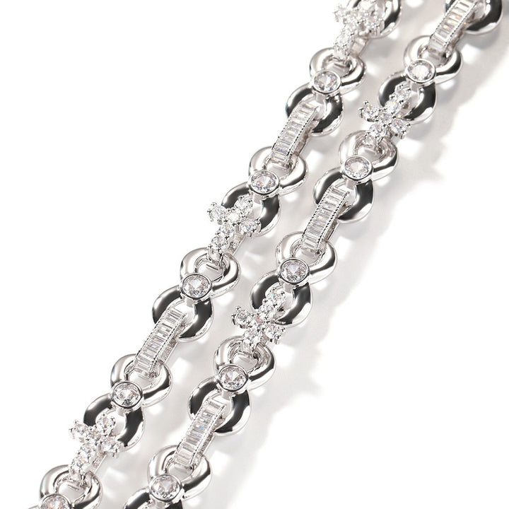 Close-up of silver-tone stone-set oval and round links