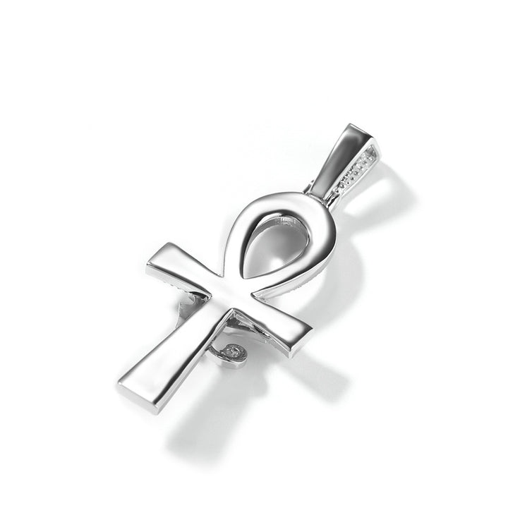 Smooth silver-tone back of an ankh pendant