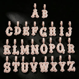 Pink-tone stone-set alphabet pendants arranged from A to Z
