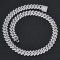 Iced out Cuban link chain with pave stones on black background - Miles Jewellery