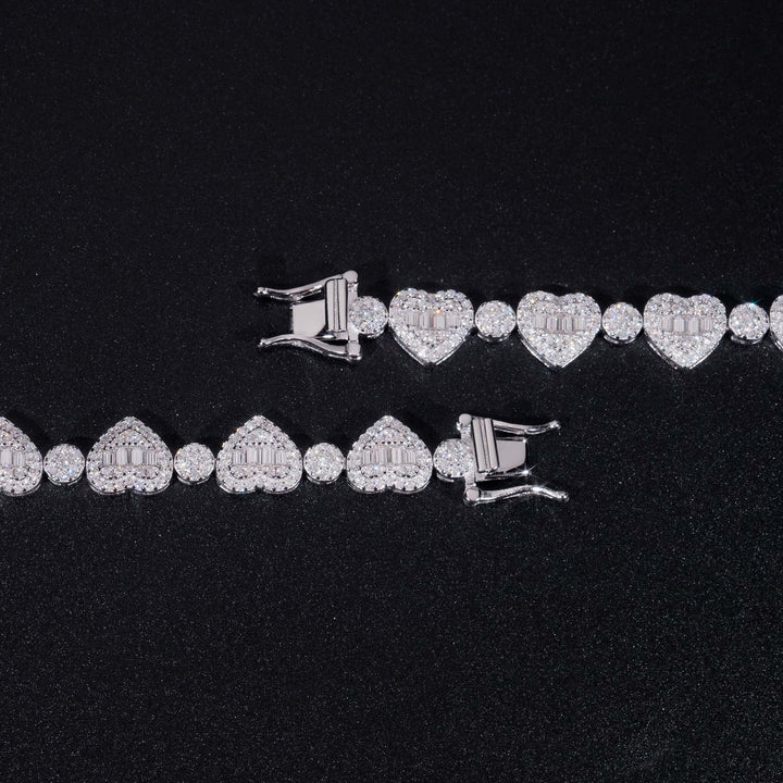 Close-up of silver-tone heart links and clasp ends