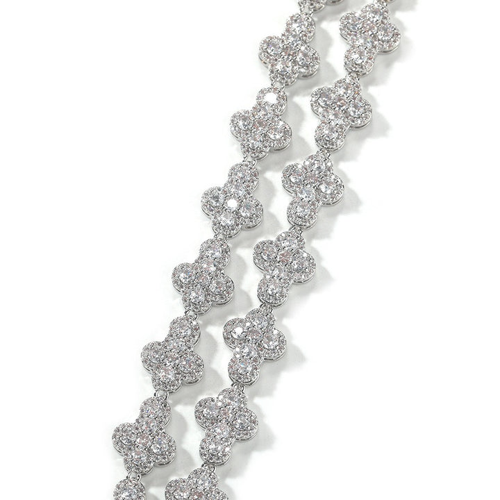 Close-up of clear stones on silver-tone flower links