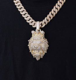 Luxury diamond-encrusted lion pendant on a thick chain against a black background
