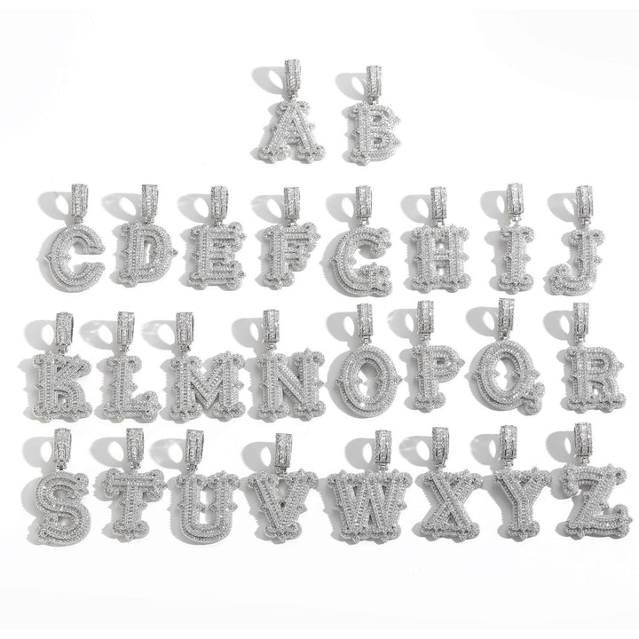 Silver-tone stone-set alphabet pendants arranged in rows on white