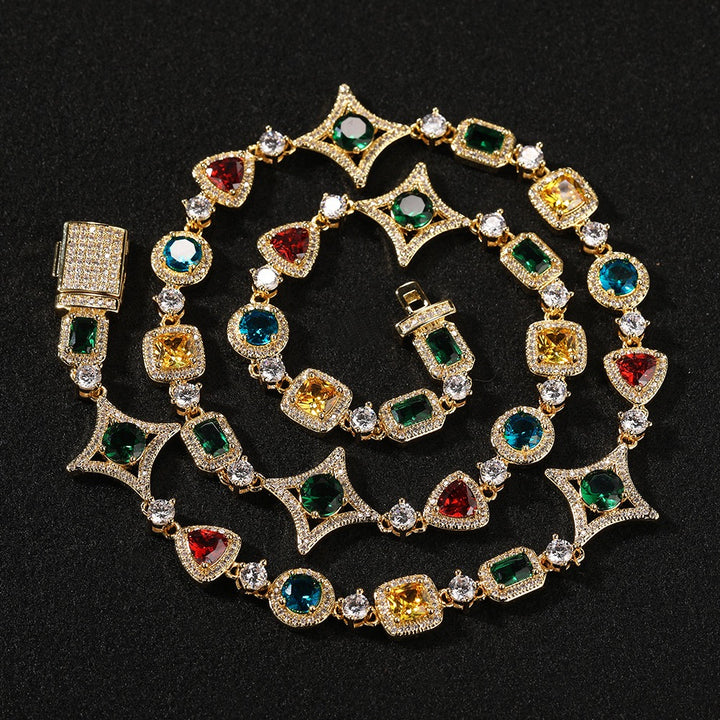 Gold-tone necklace with multicolored stones in assorted shapes coiled on black