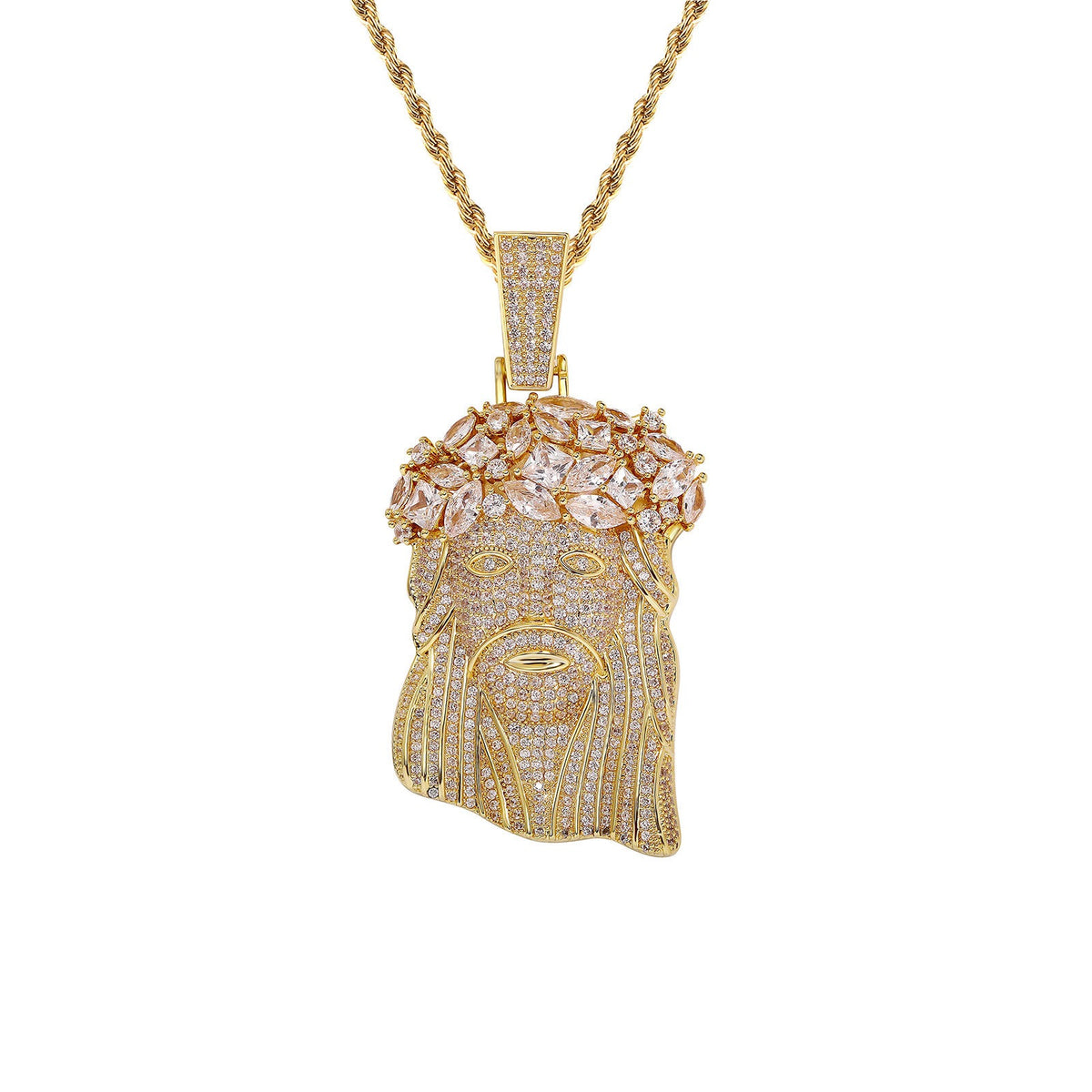 A gold Jesus head pendant necklace paved with clear cubic zirconia stones, featuring a detailed crown of thorns and a rope chain, shown on a solid white background.