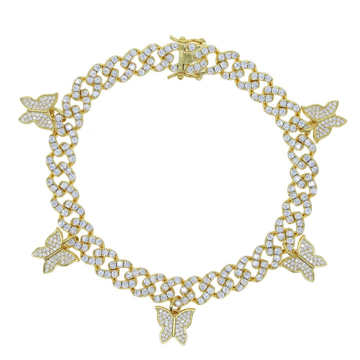 Gold-tone Cuban link bracelet with butterfly charms