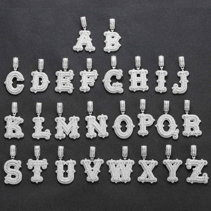 Silver-tone stone-set alphabet pendants arranged from A to Z