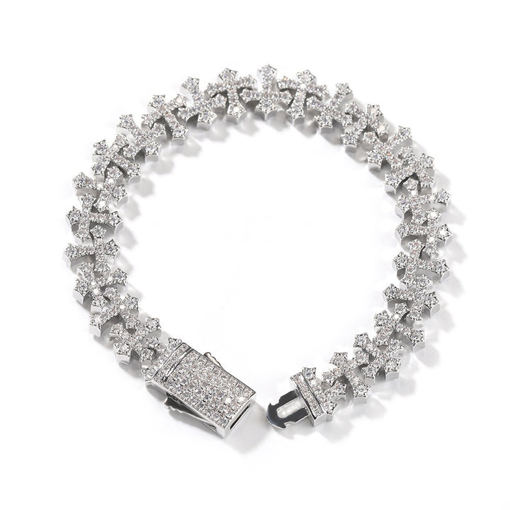 Silver-tone stone-set cross-link bracelet with an open box clasp on white
