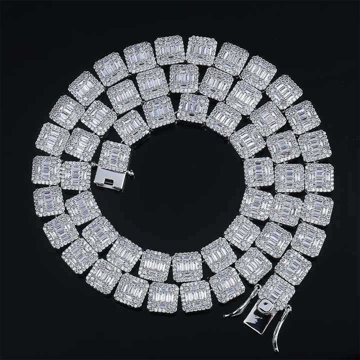 Silver-tone square-link stone-set necklace coiled on black