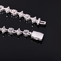 Polished backs of star and round links with an open box clasp marked S925