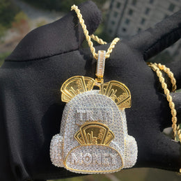 Close view of the two-tone backpack pendant and stone-set bail