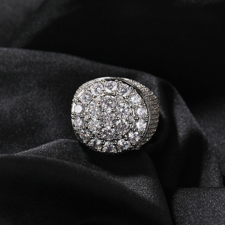 Silver-tone round cluster signet ring on dark fabric