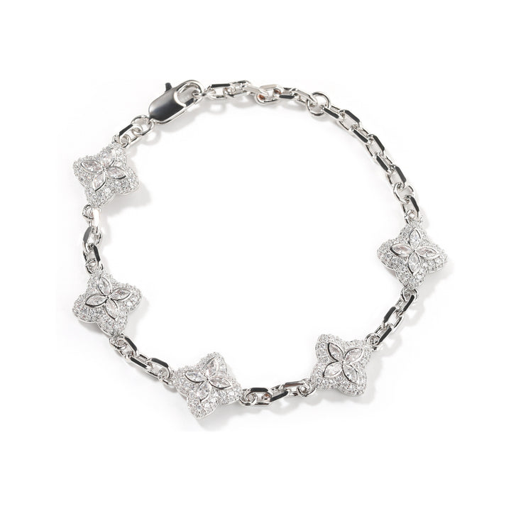 Clear-stone silver-tone four-leaf clover adjustable bracelet on white
