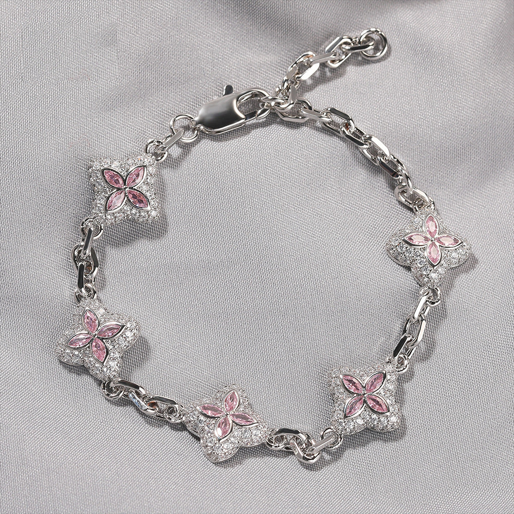 Pink four-leaf clover adjustable bracelet shown in supplier styling