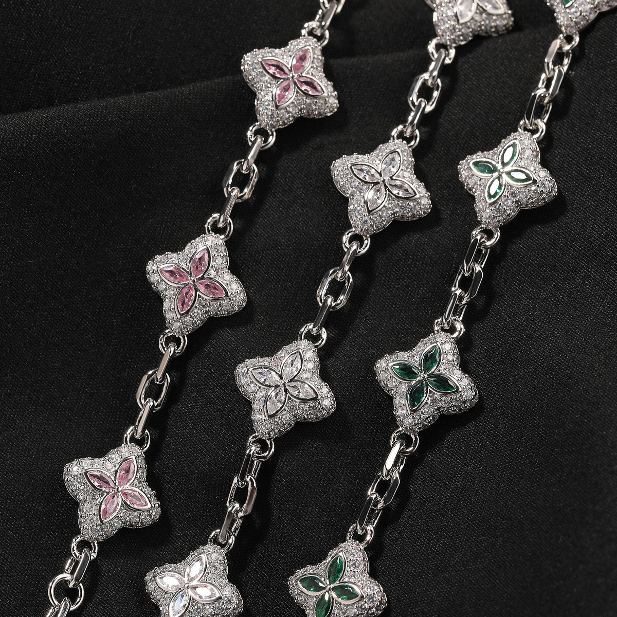Pink, clear and green four-leaf clover bracelet link details
