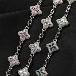 Pink, clear and green four-leaf clover bracelet link details