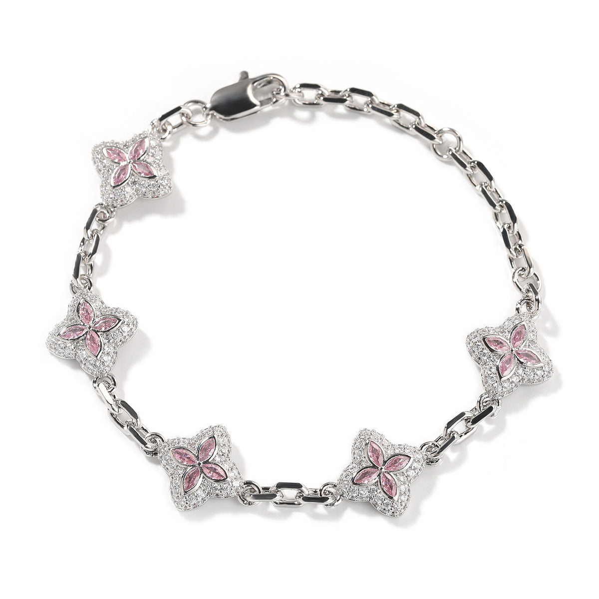 Pink four-leaf clover adjustable bracelet in a silver-tone setting on white