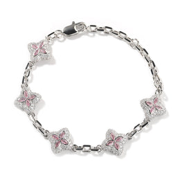 Pink four-leaf clover adjustable bracelet in a silver-tone setting on white