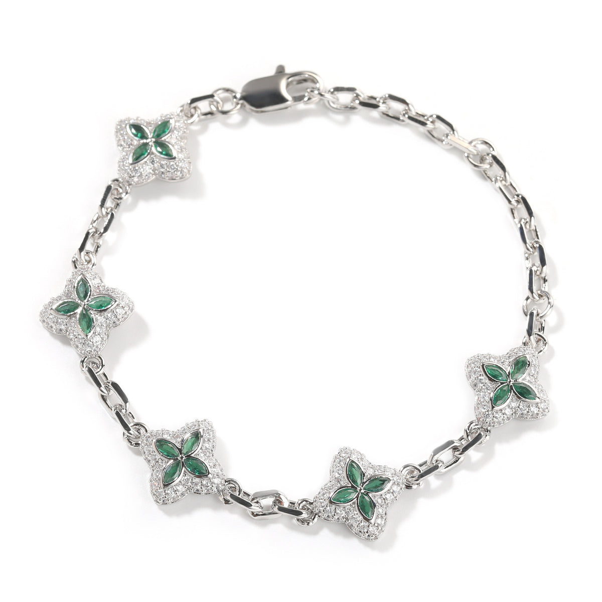 Green four-leaf clover adjustable bracelet in a silver-tone setting on white