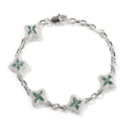Green four-leaf clover adjustable bracelet in a silver-tone setting on white