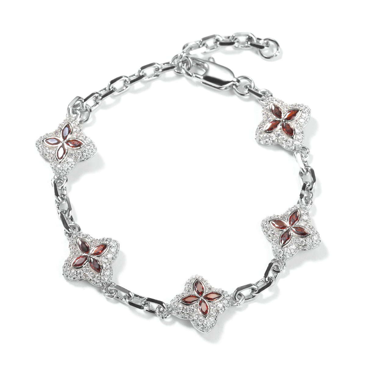 Red four-leaf clover adjustable bracelet in a silver-tone setting on white
