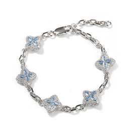 Aqua Blue four-leaf clover adjustable bracelet in a silver-tone setting on white