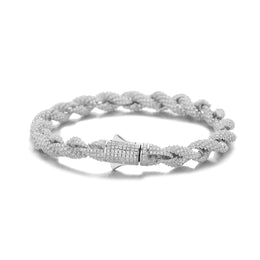 Silver-tone rope bracelet on white, showing its closed stone-set box clasp and safety catches