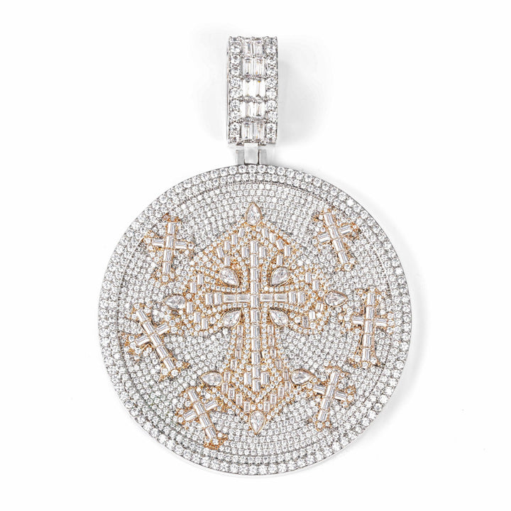 Round silver-tone medallion with a pink-tone ornate cross design