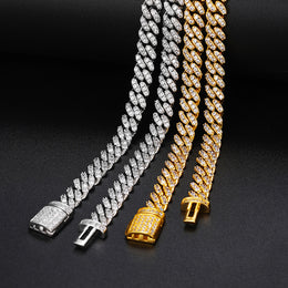 Silver-tone and gold-tone moissanite Cuban chains showing open box clasp ends
