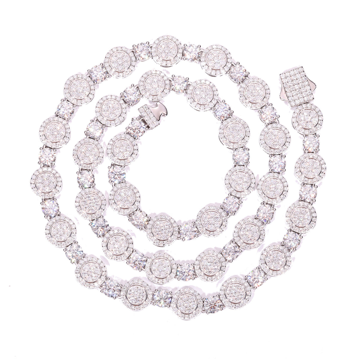 Silver-tone moissanite halo tennis chain coiled on white with its stone-set clasp visible