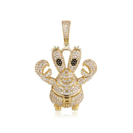 Gold iced cartoon crab character pendant on white