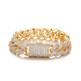 Gold 15mm iced Bubble Cuban link bracelet on white