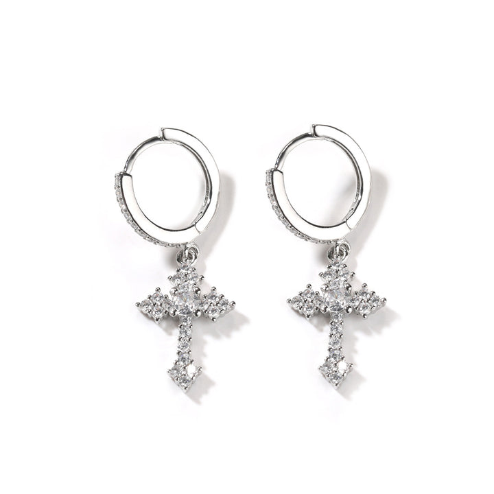 Pair of silver-tone ornate cross drop earrings on hoops