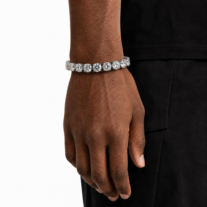 Silver-tone large round-stone tennis bracelet worn on the wrist