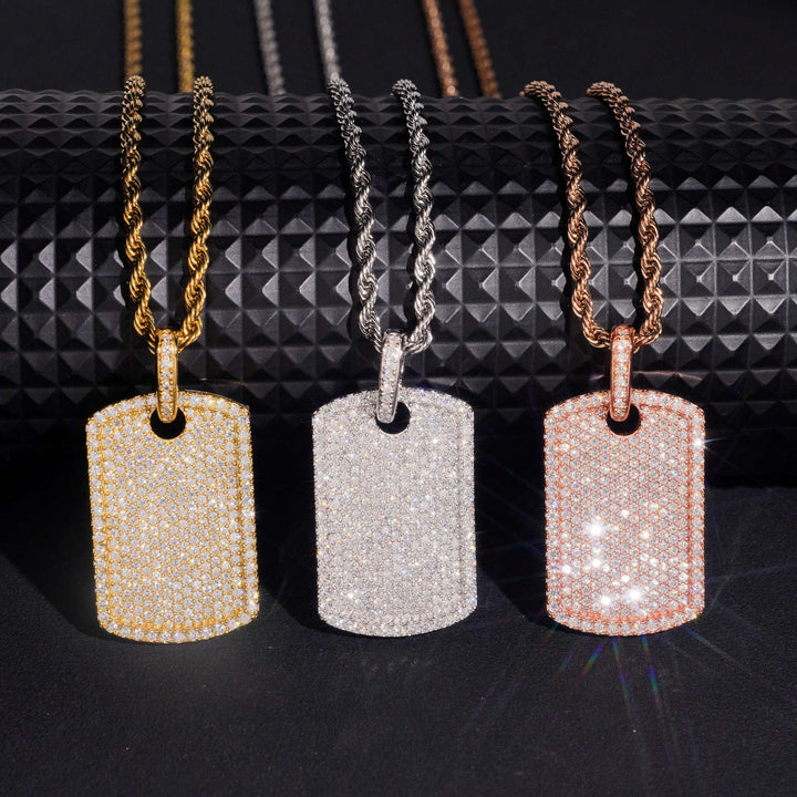 Dog tag pendants in gold-tone, silver-tone and pink-tone finishes side by side