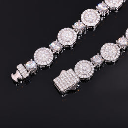 Close-up of round moissanite halo clusters, smaller round links and stone-set clasp ends