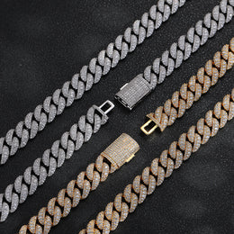 Gold and Silver iced Bubble Cuban link chain lineup on black