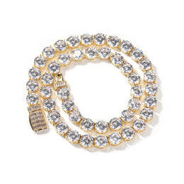 Gold-tone round cubic zirconia tennis chain coiled with its rectangular-stone box clasp