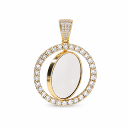 Gold-tone rotating photo pendant showing a white photo area on the tilted inner disc