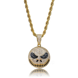 Gold iced stitched skull face pendant