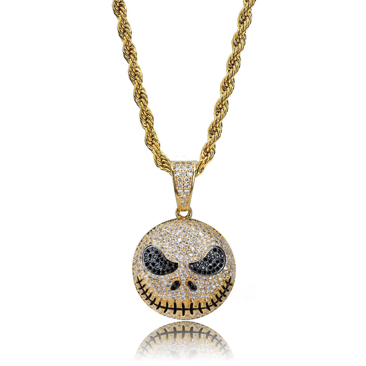 Gold iced stitched skull face pendant