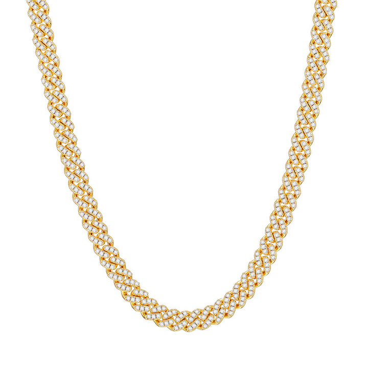 Gold-tone moissanite Cuban link chain in a U-shaped drape on white