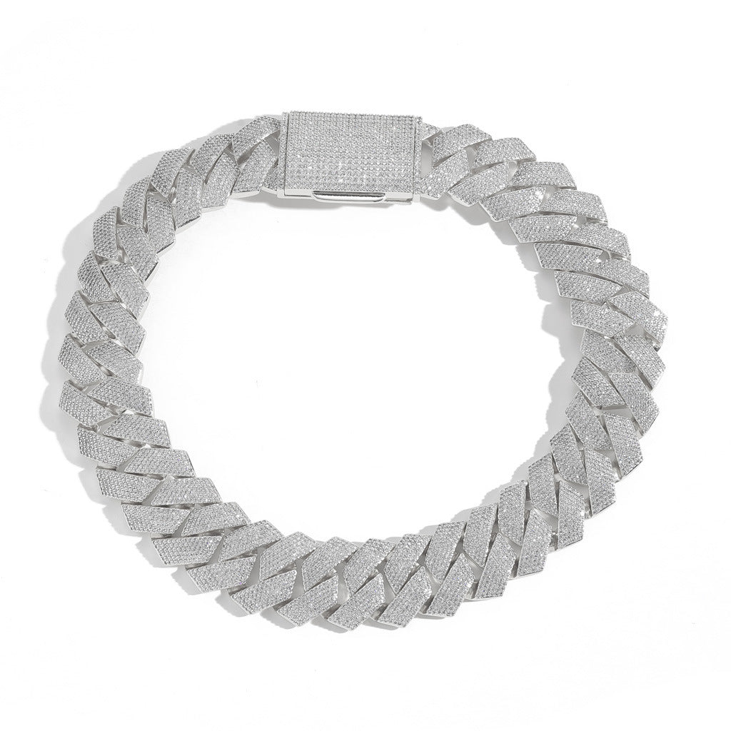 Silver-tone iced Cuban links in a full circular view on white
