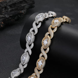 Gold-tone and silver-tone infinity eye links draped over a black display