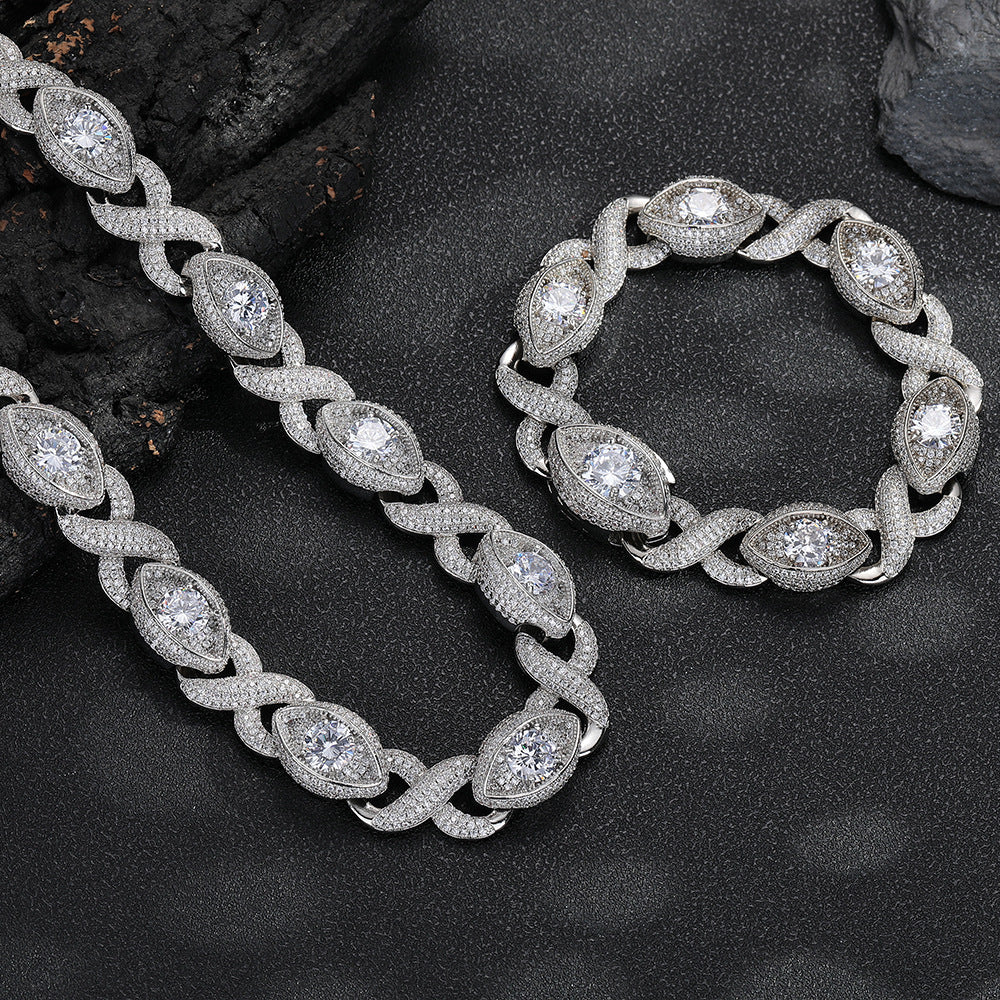 Silver-tone infinity eye-link necklace and matching bracelet on black