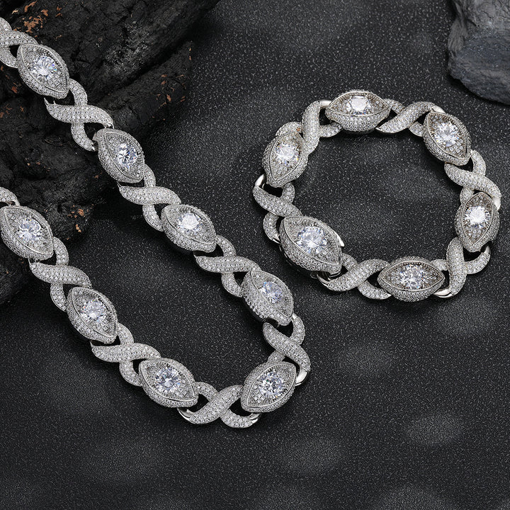 Silver-tone infinity eye-link necklace and matching bracelet on black