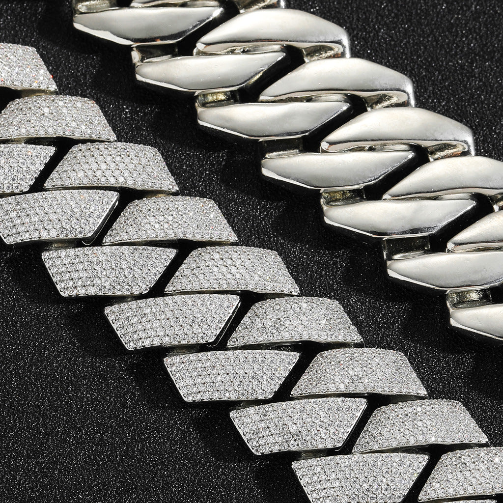 Silver-tone Cuban links showing clear pavé faces and polished undersides
