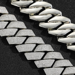Silver-tone Cuban links showing clear pavé faces and polished undersides
