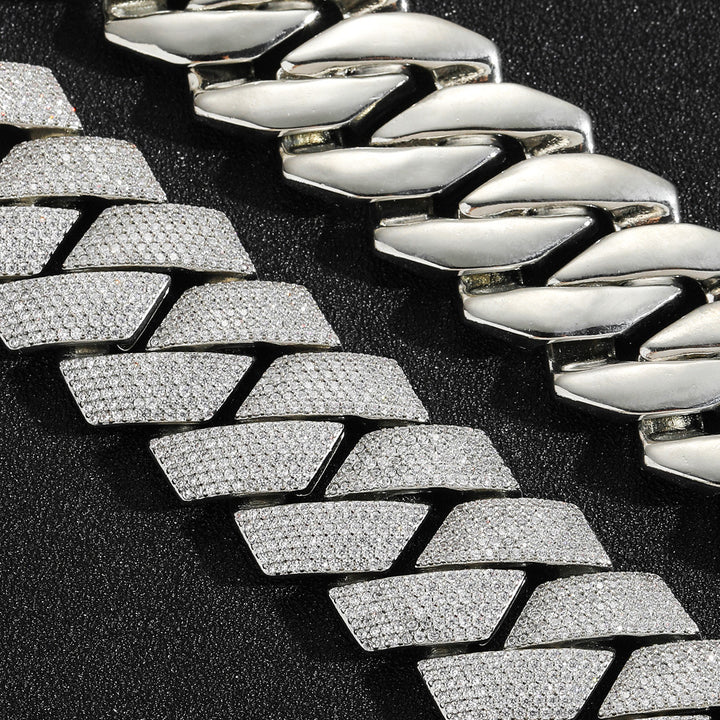 Silver-tone Cuban links showing clear pavé faces and polished undersides